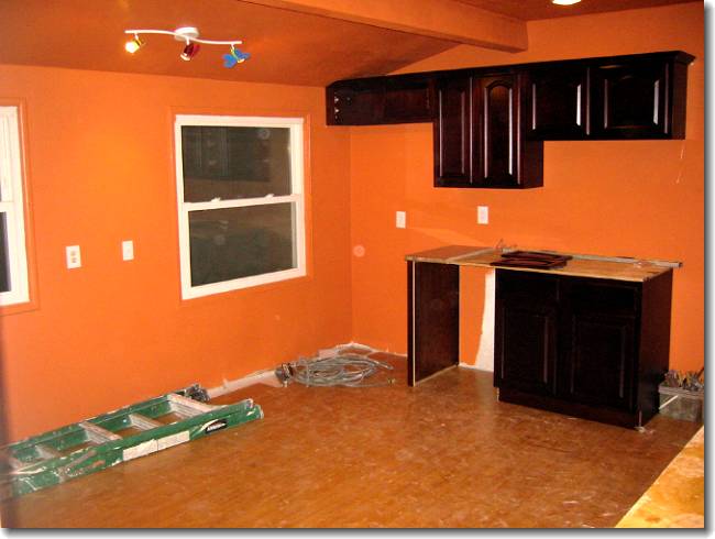 Most of the floor and some of the cabinets are now in